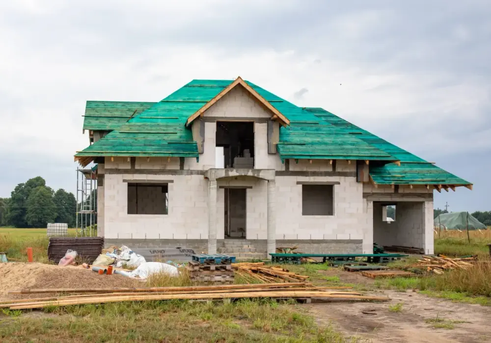 Ile kosztuje budowa domu 100m2 z poddaszem? Sprawdź realne ceny!