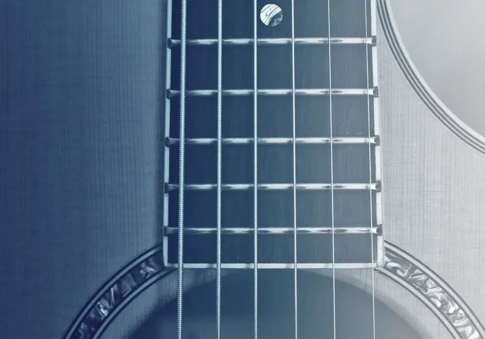 Poznaj ile strun posiada gitara klasyczna: kompletny opis budowy