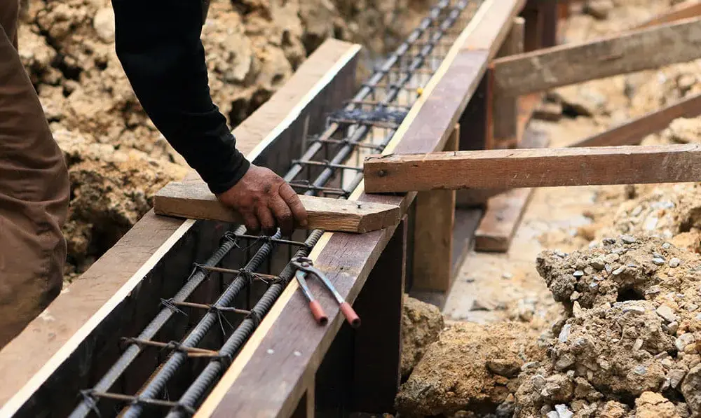 Wybór betonu na fundament: B20 czy B25 - co wybrać dla trwałości?