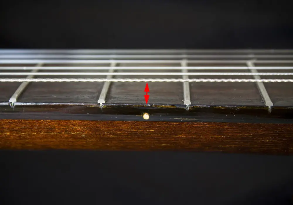 Jak prawidłowo ustawić akcję strun w gitarze elektrycznej - poradnik eksperta