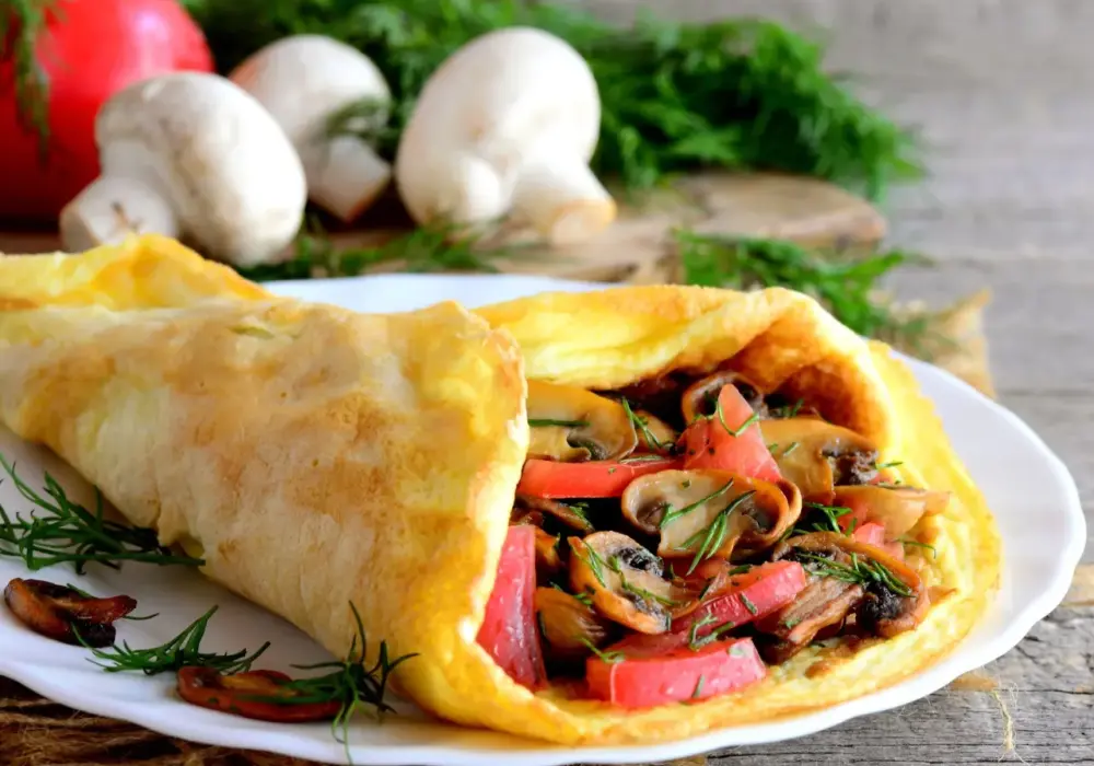 Omlet z pieczarkami - idealny przepis na puszyste śniadanie