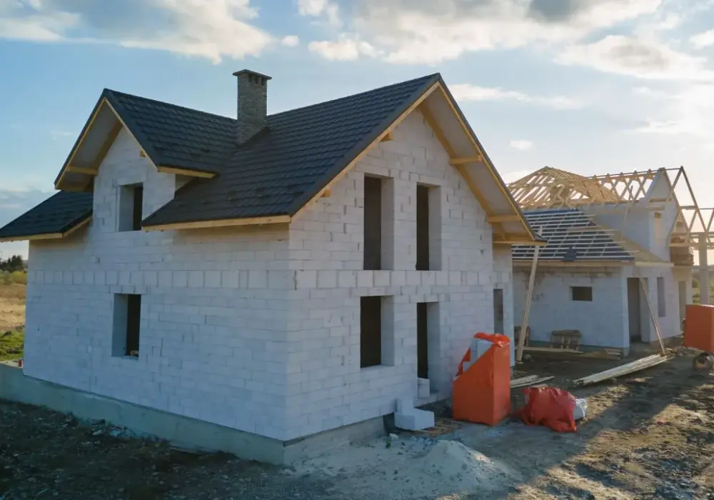 Koszt budowy domu 100m2 pod klucz - uniknij pułapek!