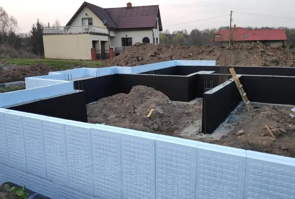 Jak skutecznie przykleić styrodur do fundamentu: poradnik krok po kroku