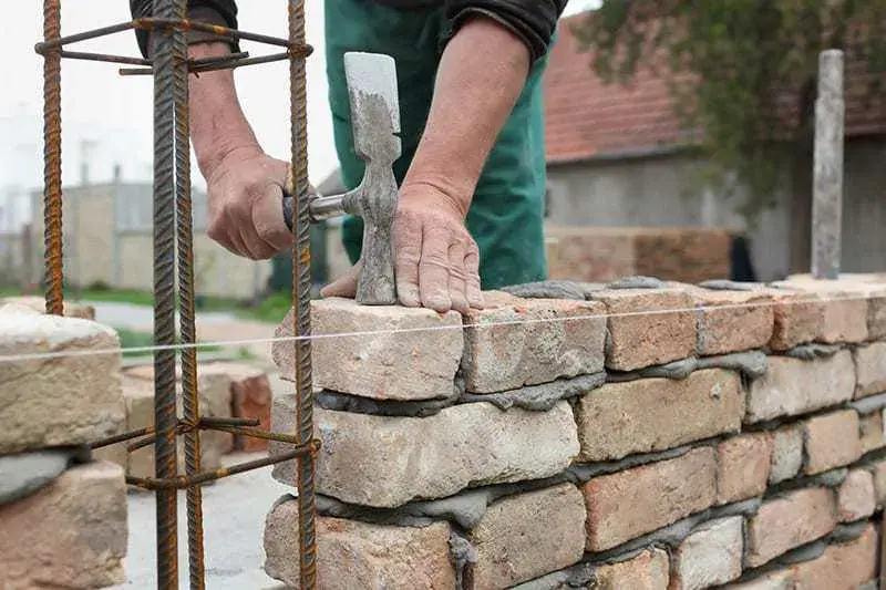 Zaprawa murarska z czego się składa - kluczowe składniki i ich rola