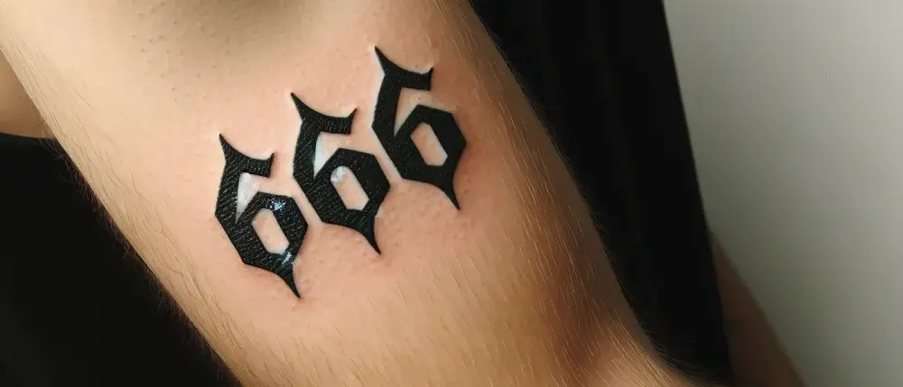 Co oznacza tatuaż 666? Szokujące znaczenia i konteksty kulturowe