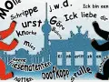 Zwei Berliner Bären tanzen vor der Skyline. Typisch berlinerisch: "Ick liebe dir" und "Keene Fiesematenten".