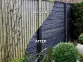 Before and after of DIY fence panels. The left side shows weathered, pale wood with bare branches, while the right side displays a sleek, dark-stained fence with lush greenery.