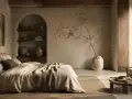 Sypialnia w stylu wabi sabi. Naturalne materiały, łóżko z lnianą pościelą, ceramiczne wazony i gałązka w wazonie tworzą spokój.