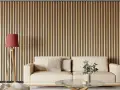 Un salón moderno con un sofá beige y una lámpara de pie, todo ello enmarcado por unas elegantes salones con madera en la pared.