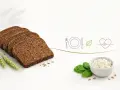 Plasterki pumpernikla, ser biały, liście szpinaku i symbole zdrowego odżywiania. Pumpernikiel kcal - zdrowy wybór.