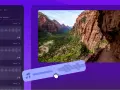Interfaz de edición de video con paisaje de cañón y lista de audios libres de derechos.