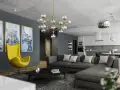 Nowoczesny salon z szarą kanapą, żółtym fotelem i abstrakcyjnymi obrazami. Duże okna wpuszczają dużo światła dziennego, oświetlając wnętrze.
