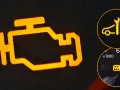 Pomarańczowy symbol check engine świeci się, sugerując problem z silnikiem lub słabe paliwo. Obok kontrolka serwisu i kontrolka ciśnienia w oponach.