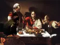Wieczerza w Emaus Caravaggia: Jezus błogosławi posiłek, a jego towarzysze rozpoznają go w geście zdumienia.