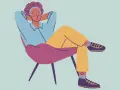 A person relaxes in a chair, hands behind their head, demonstrating how to decompress.