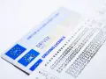 Carte di circolazione UK e un foglio con dati tachigrafo, forse per la sospensione carta di circolazione.
