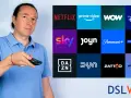 Mann mit Fernbedienung vor Logos beliebter Streaming-Dienste in Deutschland wie Netflix, Prime Video, Sky, Disney+.
