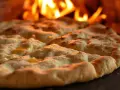 Jak zrobić idealny spód do pizzy? Przepis i sekrety mistrzów