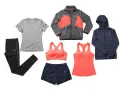 Ensemble de vêtements de sport pour femme : legging noir, t-shirt gris, brassière et short corail, débardeur corail, veste grise et corail, sweat à capuche bleu marine. Le tissu technique sport assure confort et performance.