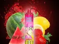 Explosión de sabores tropicales: sandía, limón, fresas y kiwi en un torbellino de jugo rojo.