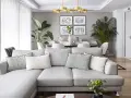 Sofá gris y plantas verdes, ideas de colores para pintar salones pequeños. Paredes neutras y suelo de madera.