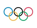 Pięć splecionych kół symbolizujących jedność i ducha sportu - flaga olimpijska.