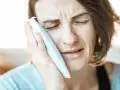 Ropień na dziąśle: jak rozpoznać i co robić? Pilna wizyta u dentysty!
