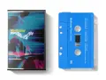 Kaseta Mudhoney "Plastic Eternity" - pamiątka z mojej podróży. Niebieska kaseta z listą utworów, obok okładka albumu.