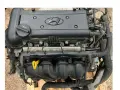 Silnik Hyundai i30 1.4 benzyna, gotowy do montażu. Widoczny korek wlewu oleju i żółta miarka.