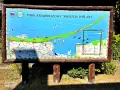 Mapa Parku Krajobrazowego Mierzeja Wiślana, ukazująca Zatokę Gdańską i Zalew Wiślany z ptactwem.