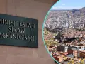 Tablica "Ministerstwo Spraw Zagranicznych" obok panoramy miasta, gdzie nie jechać.