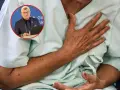 Lekarz omawia objawy grypy wariant K. Pacjent trzyma się za klatkę piersiową, odczuwając dyskomfort.