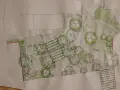 Trädgårdsdesign i akvarell visar hur ritar man en vacker oas med damm, gångar och planteringar.