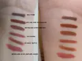 Testy odcieni na przedramieniu, w tym Maybelline Lifter Liner.