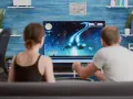 Para dowiedzieć się, ile prądu zużywa telewizor, para gra w grę kosmiczną.