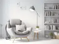 Un sillón cómodo junto a una estantería llena de libros, creando una acogedora biblioteca en casa.