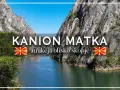 Kanion Matka, malownicza atrakcja blisko Skopje, z wodą odbijającą skaliste zbocza i błękitne niebo.