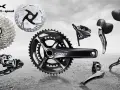 Komponenty rowerowe Shimano GRX: kaseta, korba, przerzutki, hamulce i manetki. Idealne do gravelowych wypraw.