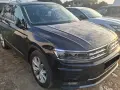 Czarny Volkswagen Tiguan, auto zastępcze z OC sprawcy, stoi na parkingu.