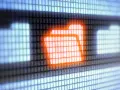 Leuchtendes Ordnersymbol auf einem Bildschirm, das die Arbeit mit java nio files symbolisiert.