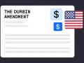 A document titled "The Durbin Amendment" with dollar signs and the US flag, symbolizing financial regulation.