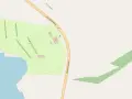 Mapa kempingu Kozica nad wodą, z drogą Jadranska magistrala, parkingiem i budynkami.