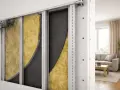 Installazione di isolamento acustico in lana di roccia e membrana per capire quanto costa insonorizzare una parete.