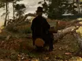 Un peintre hollandais du 20ème siècle, chapeau sur la tête, peint en plein air, assis sur une souche au milieu d'une forêt.
