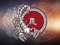 Skorpion, symbol najsilniejszego znaku zodiaku, w otoczeniu kryształów i koła zodiaku.