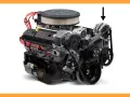 Chevrolet V8 engine with an alternator (arrow pointing). Wondering how long does an alternator last? This component is key to your car's electrical system.
