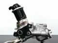 A car's EGR valve, a component that can cause bad EGR valve symptoms if faulty.