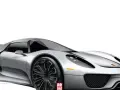 Srebrny Porsche 918 Spyder na białym tle, z widocznym logo "Auto Świat".