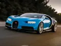 Niebieskie Bugatti Chiron w ruchu, z widocznym logo i światłami.