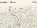 Karte zeigt die Route von Oberstdorf nach Meran durch die Alpen, vorbei an Immenstadt, Landeck und dem Naturpark Texelgruppe.